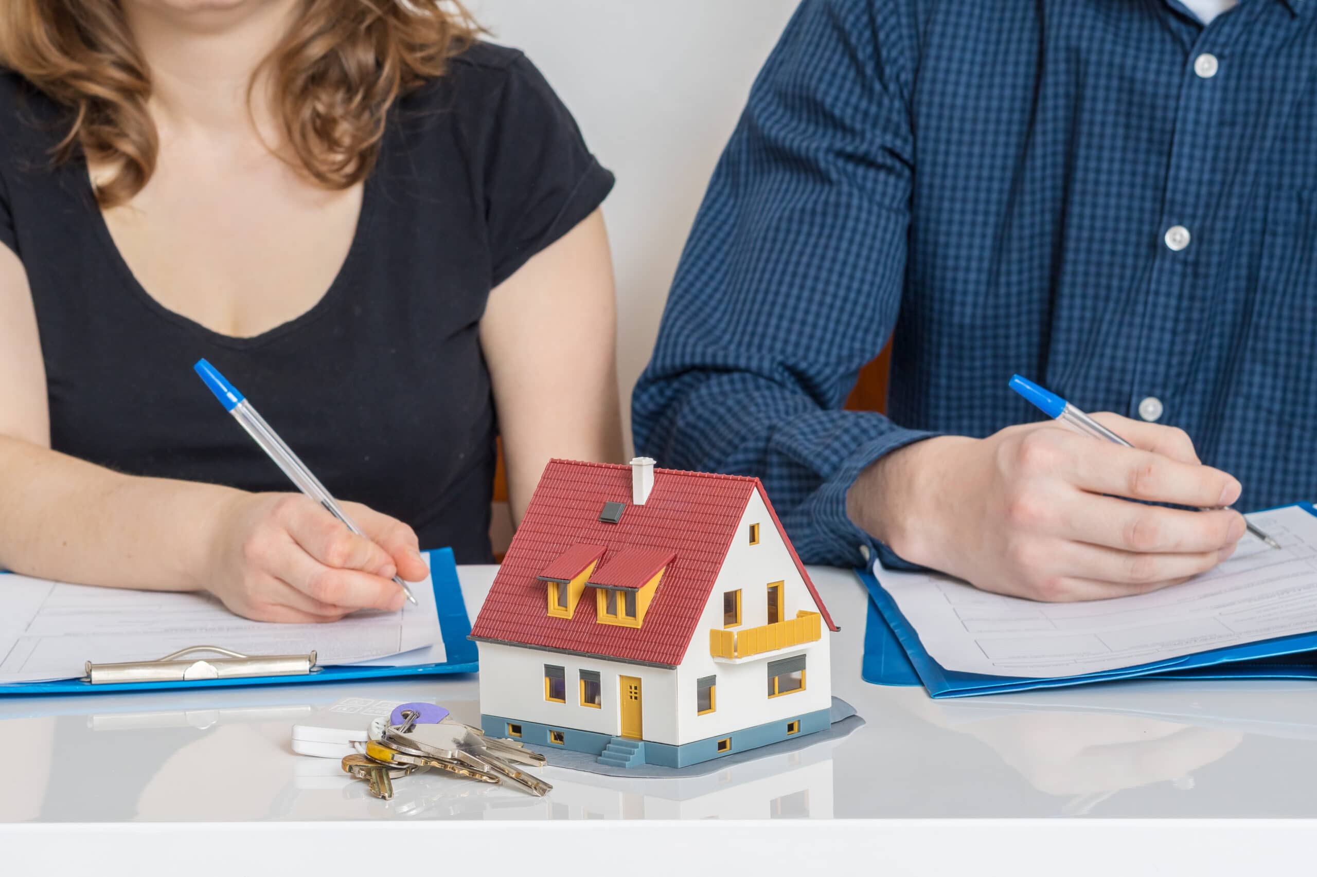 How do I keep my house in a divorce settlement