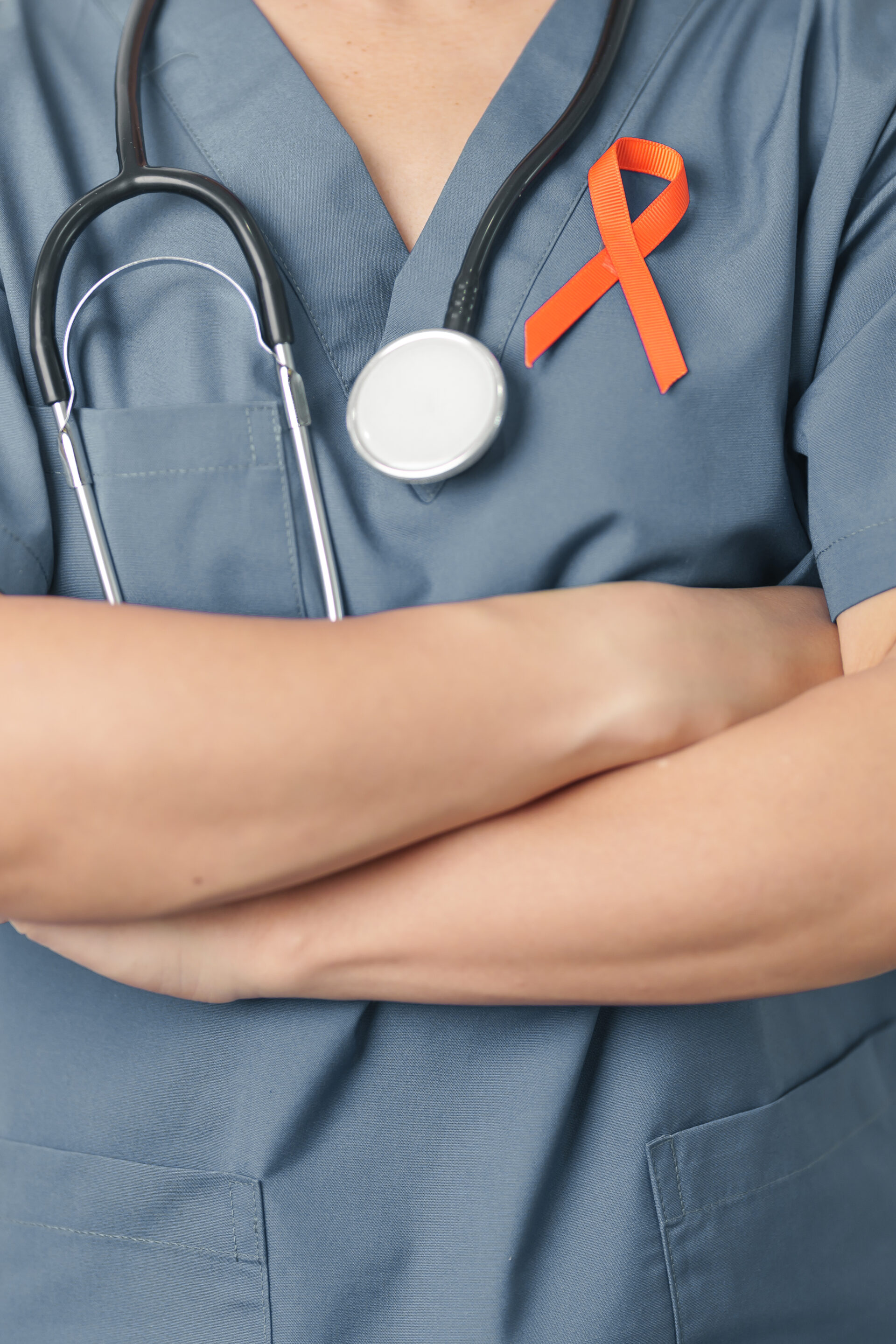 doctor wearing orange ribbon for MS awareness